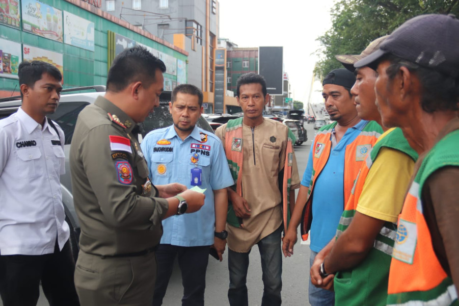 Tarif Parkir Turun, Satpol PP Pekanbaru Turut Sosialisasikan ke Jukir dan Masyarakat